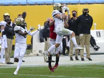 Ball drop: Wisconsin wins Duke’s Mayo Bowl, breaks trophy